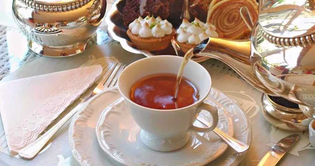 Dark English Breakfast tea leaves in a cup